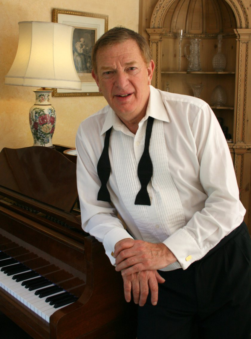 Robert Habermann by a piano